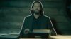 Live action Alan Wake at a type writer in Alan Wake 2