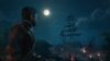 Skull and Bones key art of pirate looking out at docked ship in the moonlight at night