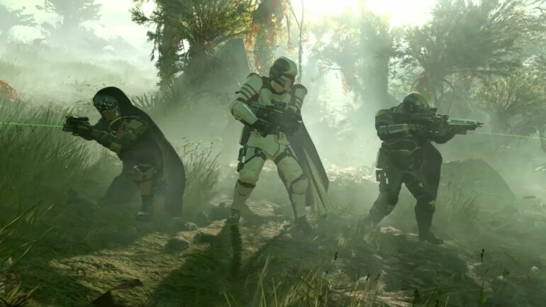 Three Helldivers aiming their weapons in Helldivers 2
