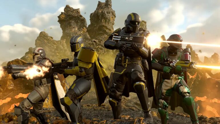 Four Helldivers standing next to each other shooting in Helldivers 2