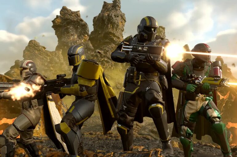 Helldivers shooting Terminids and Chargers in Helldivers 2