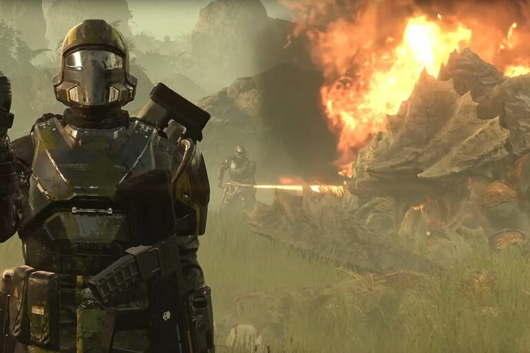 Helldivers 2 salute in front of monster