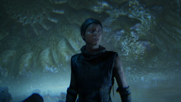Senua in a pool of water in Hellblade 2